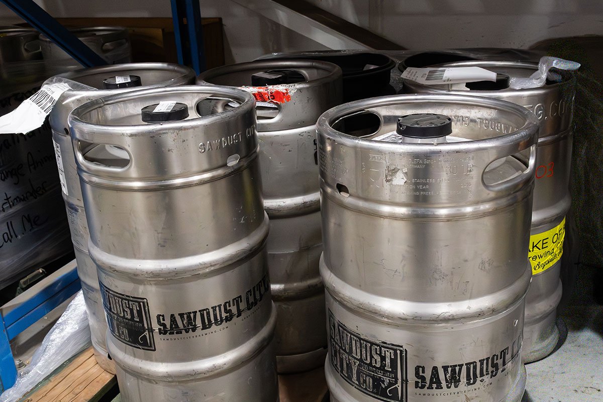 Craft beer keg management in QRC Logistics warehouse, with labeled kegs staged for pickup, storage, and returns.